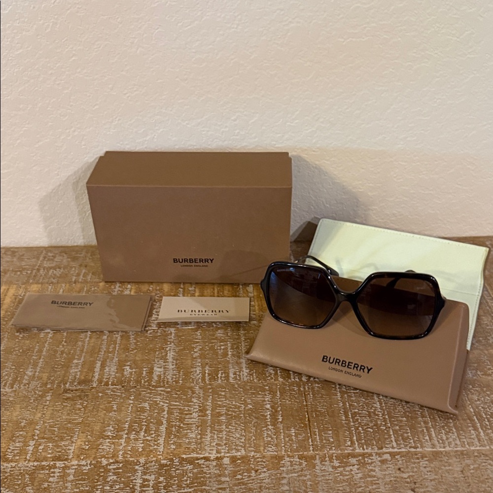 Burberry Women's Sunglasses in Black and Brown